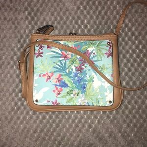 A cross body purse.